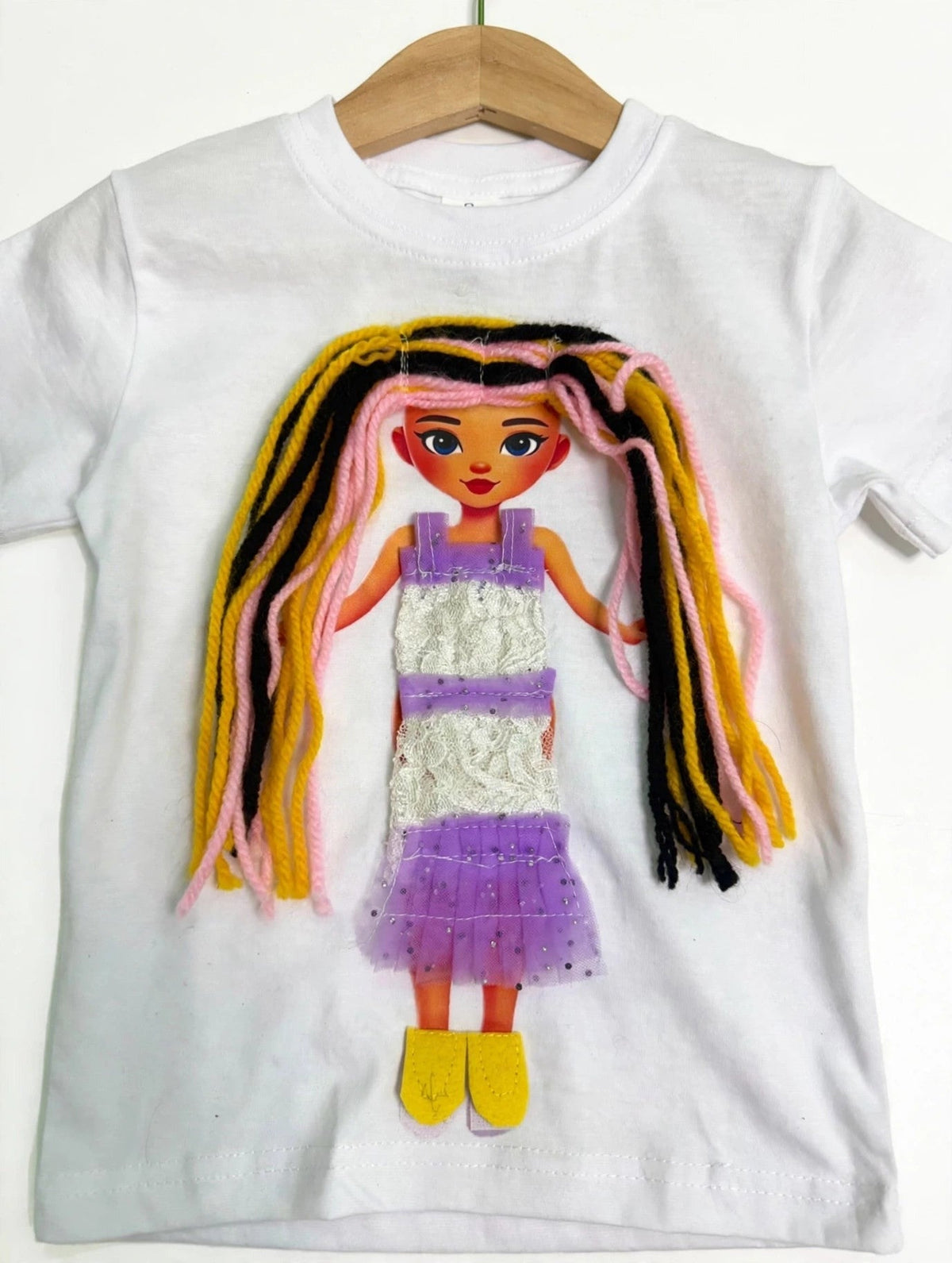 Handmade streaked hair doll design in lace dress on white T-shirt, product photo