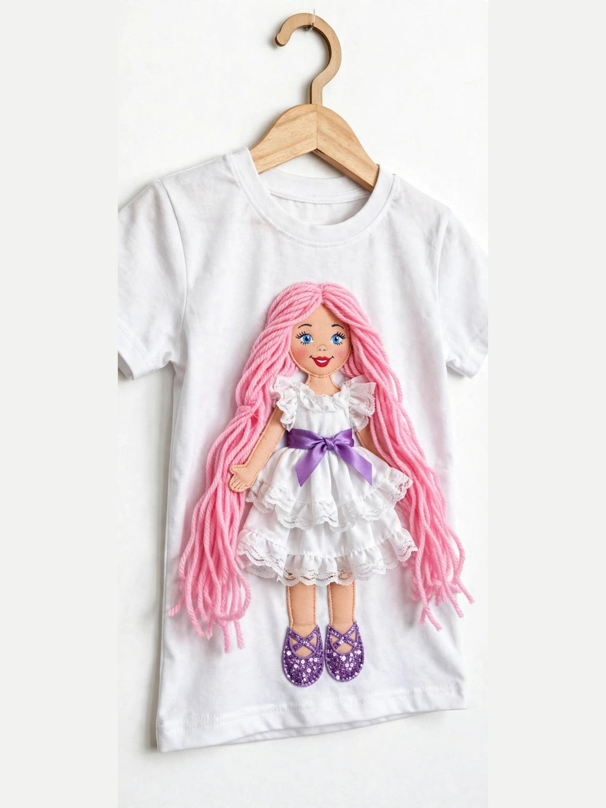 White doll T-shirt with pink-haired doll in ruffle dress, alternate product photo